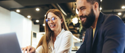  A man and women smiling each other.