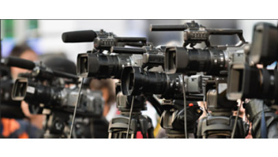 Four news cameras.