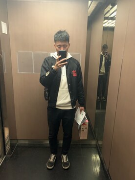 「NIKE SPORTSWEAR（ナイキスポーツウェアー）のアイテム（トップス）」を使った、董恩翔さん（メンズ・178cm）の冬コーディネート
