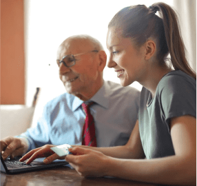 Technician fixing a slow computer in Collier County