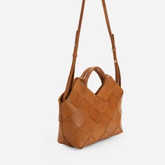 The Acacia Woven Handbag is your go-to accessory for any occasion, offering both style and sustainability. Its woven, flexible exterior pairs perfectly with casual outings, while the lined interior pockets provide organized storage for work or travel. The slim, removable shoulder strap adds versatility, allowing you to wear it as a crossbody or carry it as a chic handbag. Elevate your wardrobe with the Acacia Woven Handbag, ideal for day-to-night transitions and any event in between. Everyday Bucket Bag With Braided Handles, Natural Satchel With Top Handle And Detachable Strap, Natural Tote Box Bag For Everyday, Chic Natural Color Box Bag For Everyday Use, Rectangular Everyday Bags With Braided Handles, Natural Satchel With Braided Handles For Daily Use, Versatile Natural Shoulder Bag For Shopping, Natural Top Handle Hobo Bag For Daily Use, Natural Top Handle Bag For Everyday Use