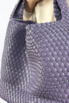 Spruce up your style with this charming, woven hobo bag. The roomy interior is perfect for stashing all your essentials and even comes with a bonus travel bag. Dimensions: L 15" x H 11.5" x W 5.75" Chic Woven Bags, Woven Leather Bucket Bag With Double Handle For Errands, Woven Bucket Bag For Errands, Woven Bags With Double Handle For Errands, Woven Leather Satchel Shoulder Bag For Errands, Double Handle Woven Leather Bucket Bag For Errands, Woven Leather Bucket Bag For Everyday Use, Woven Double Handle Bag For Errands, Woven Pouch Shoulder Bag For Everyday Use