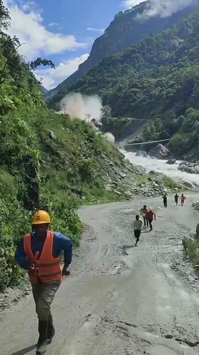 Workers flee catastrophic flood