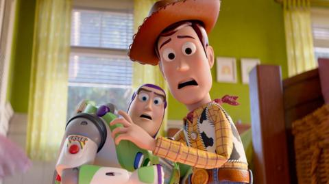 A still of Buzz and Woody from Toy Story 5, both looking shocked 