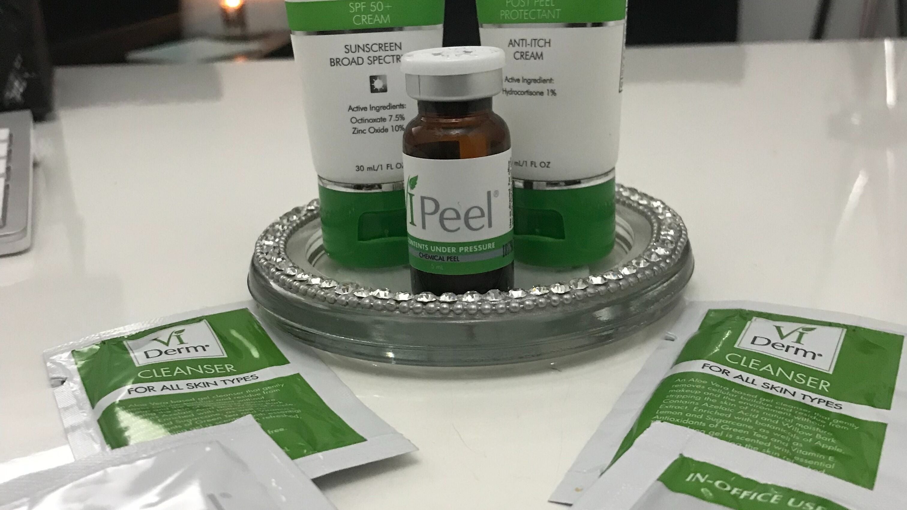 Skincare products at ELEVATE, New York, New York, US featuring VI Derm cleanser and iPeel chemical peel.