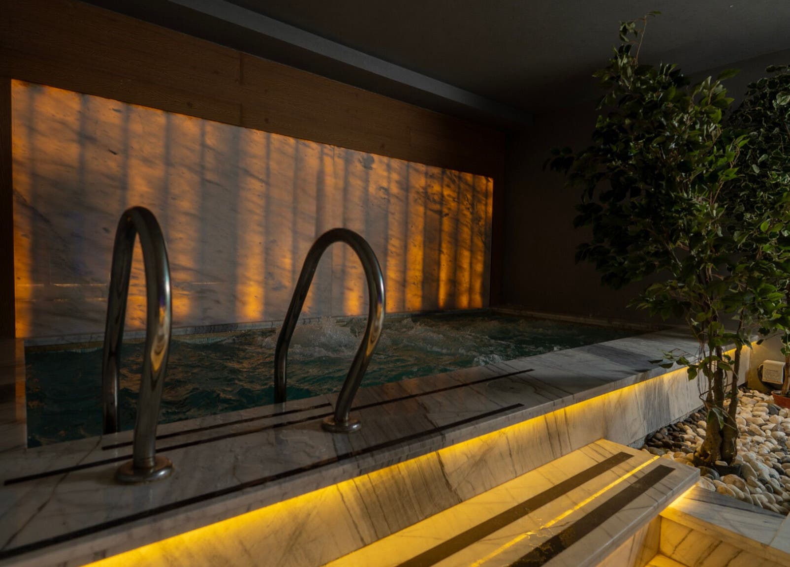 Luxurious spa pool with ambient lighting at Aurora Spa Alnarjis | أورورا سبا النرجس, Riyadh, Riyadh Province, SA.
