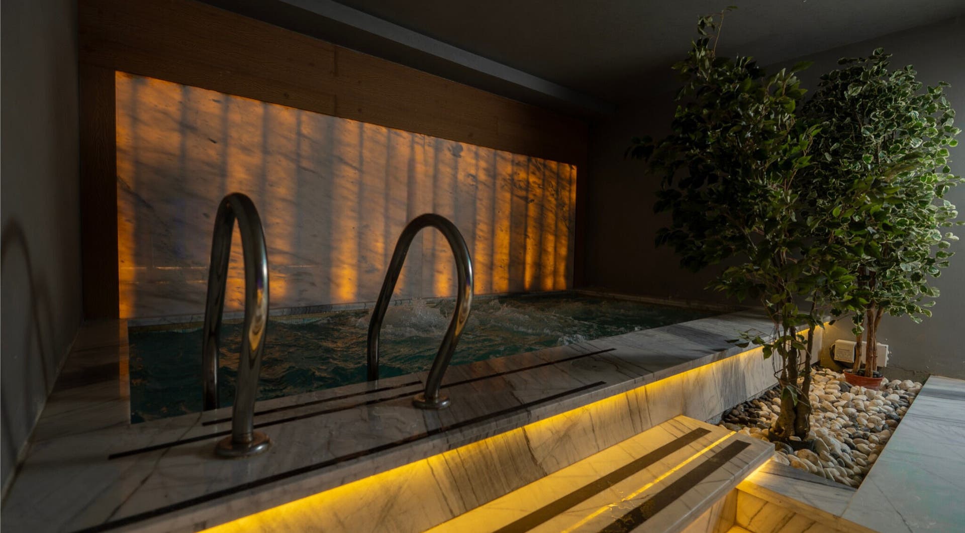 Luxurious spa pool with ambient lighting at Aurora Spa Alnarjis | أورورا سبا النرجس, Riyadh, Riyadh Province, SA.