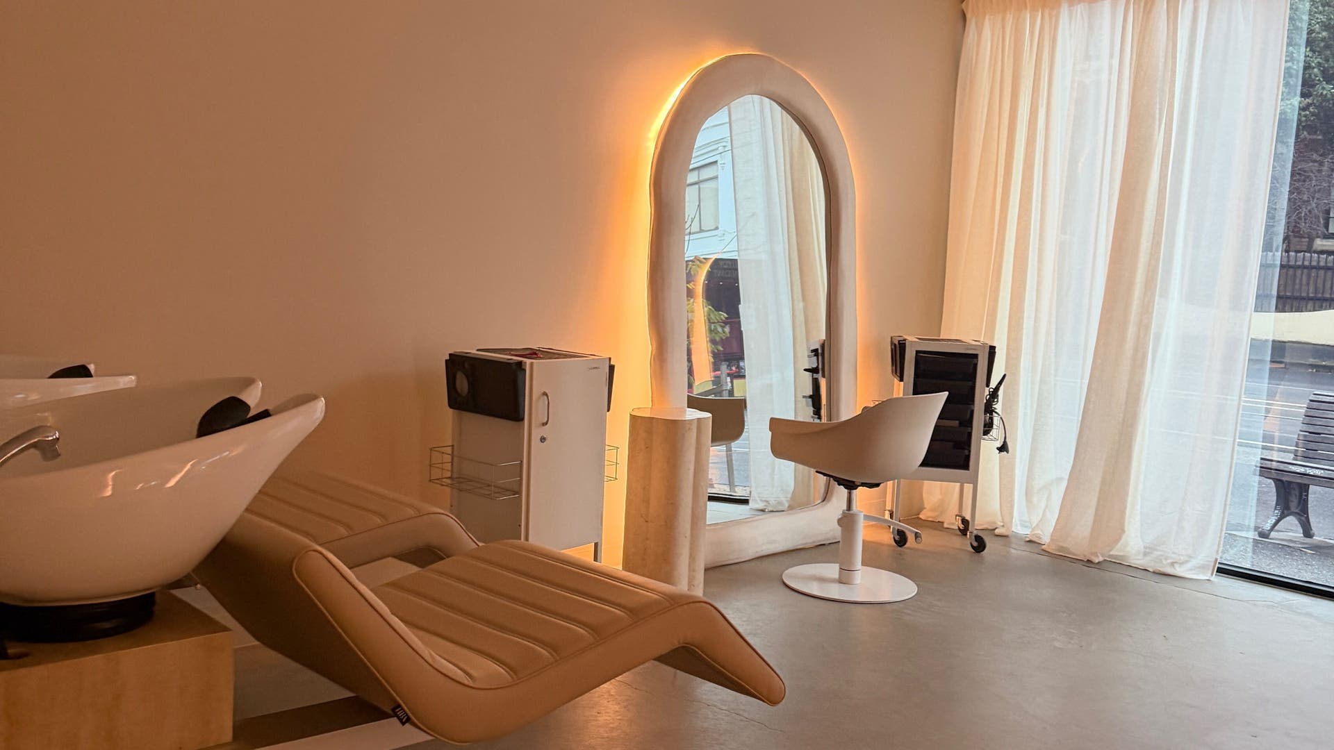 Chic salon interior with stations at HAIR ON HIGH, Melbourne, Victoria, AU, showcasing luxury and comfort.