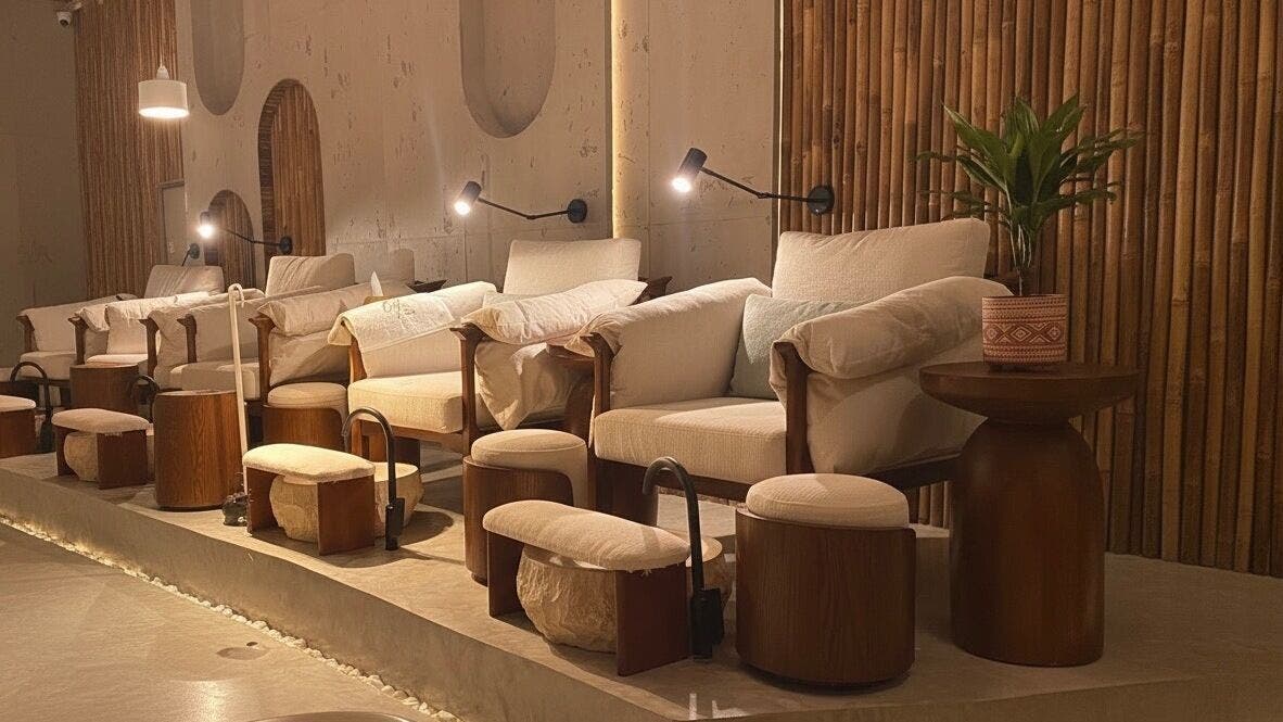 Luxurious seating at Côte nail spa | كوت سبا in Riyadh, Riyadh Province, SA, featuring plush chairs and footrests.