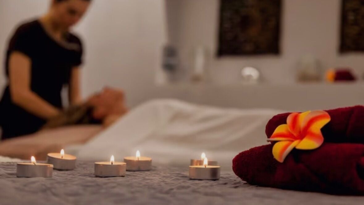Relaxing massage at Beauty With Christina in Warwick, England, GB with candles and spa decor.