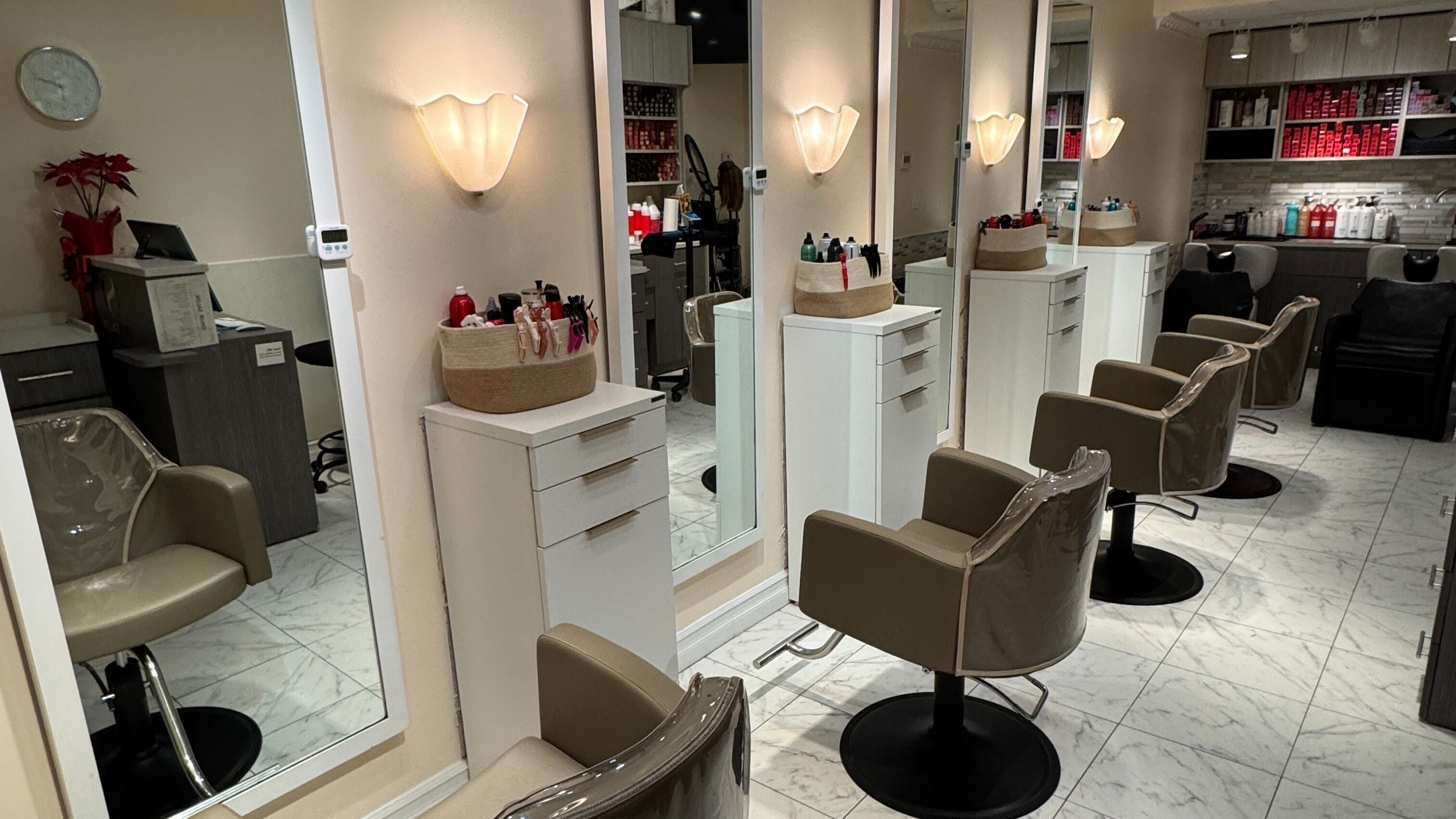 Stylish interior of Onur Salon in New York, New York, US, showcasing sleek chairs and modern decor.