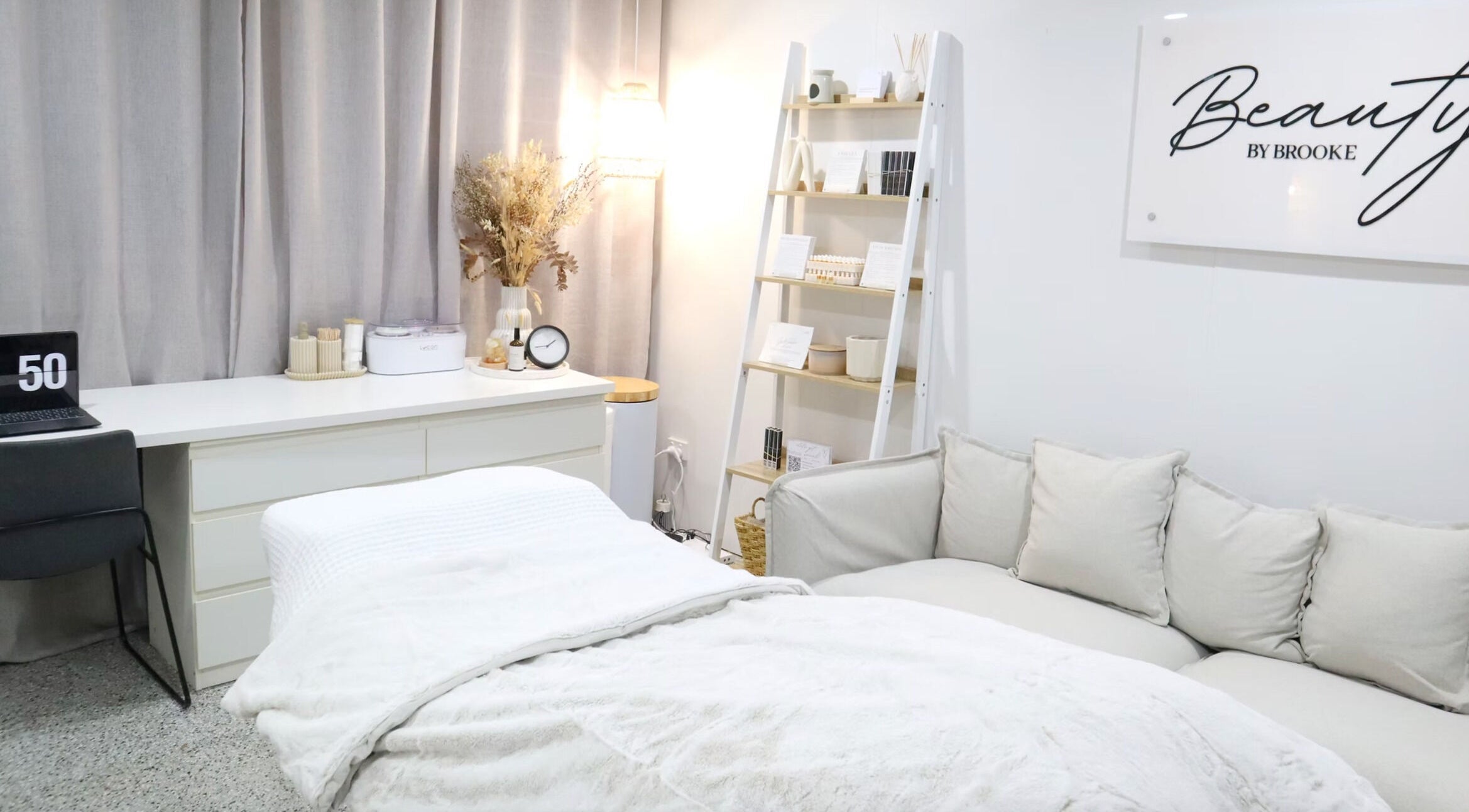 Relaxing beauty room at Beauty by Brooke, Melbourne. Cozy decor with soft lighting.