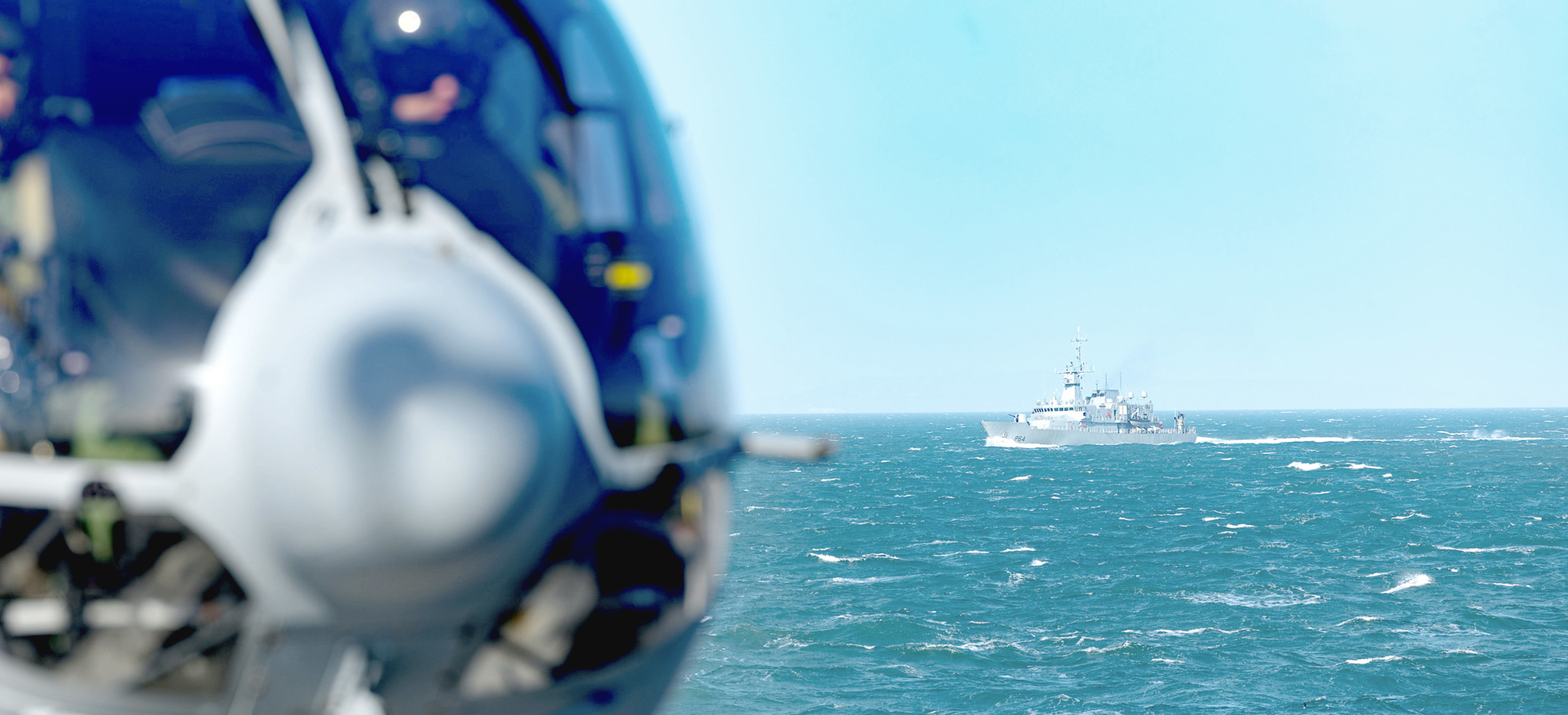 Helicopter and battleship