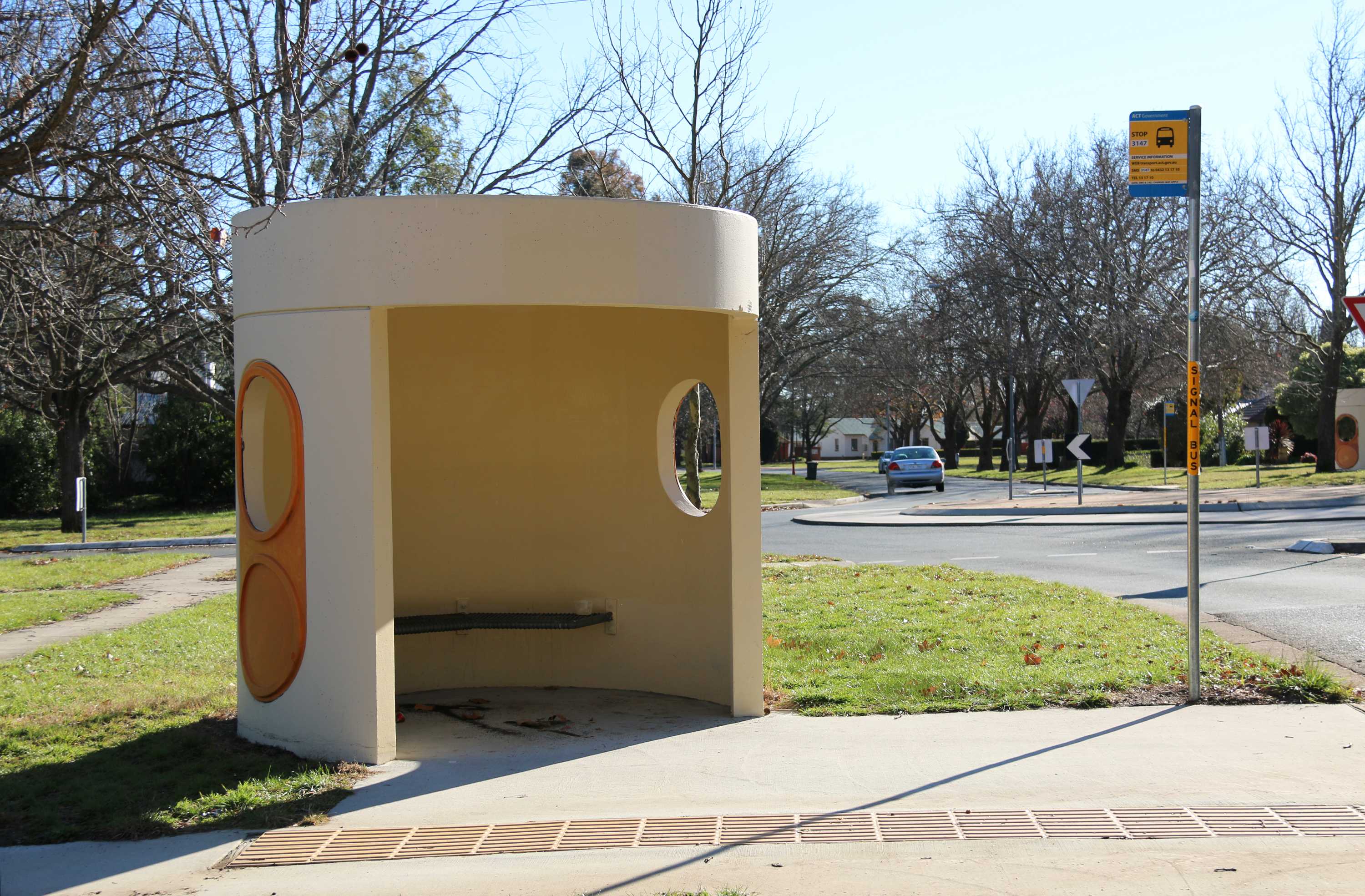 A round bus shelter.