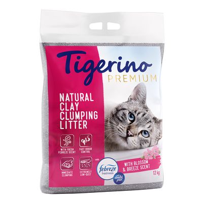 Natural clay clumping litter with Febreze freshness, fast odour control, immediate clumping, low dust, and blossom & breeze scent. 12kg bag shown.