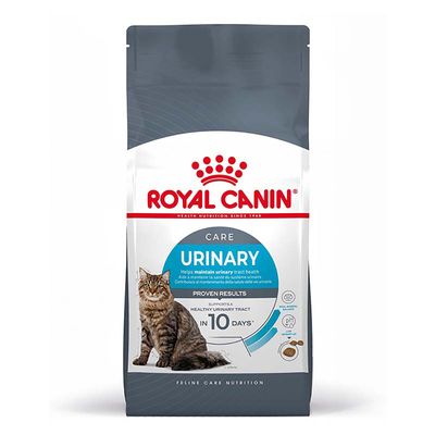ROYAL CANIN URINARY macskaeledel csomag, szöveg: Segít a húgyutak egészségének megőrzésében. Supports a healthy urinary tract in 10 days*. Egy tápdarab képe is látható.