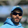 <i class="tbold">ravindra jadeja</i>