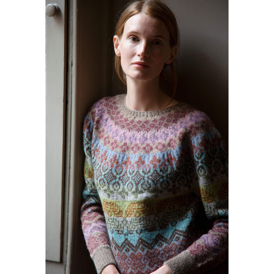 The Woolly Thistle Aisling Yarn Set in Marie Wallin's British Breeds from CHERISH woman wearing Aisling sweater