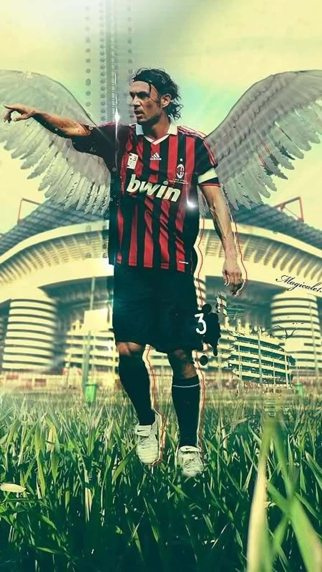 Un'immagine eccezionale che mostra l'abilità e la determinazione di Paolo Maldini, l'iconico calciatore italiano. Catturato nel vivo dell'azione, rappresenta magnificamente lo spirito e la passione dello sport. Ideale come schermata iniziale per i tifosi di calcio e gli ammiratori della stella imbattibile, Maldini. — Le foto del Milan Sfondi
