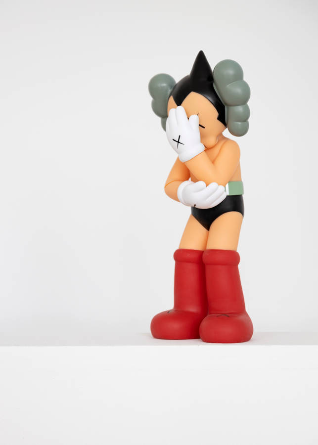 red and black mickey mouse figurine
