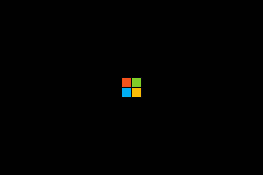 Windows-logo over een zwarte Microsoft wallpaper.