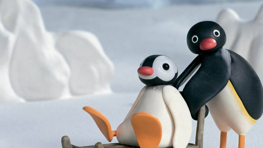 Pingu speelt met Pinga wallpaper