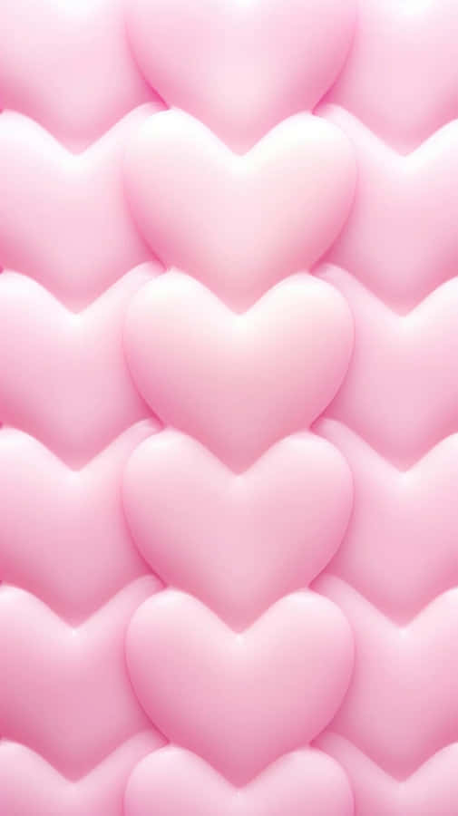 Un motif de ballons roses en forme de cœur étroitement serrés, créant un effet texturé et tridimensionnel.