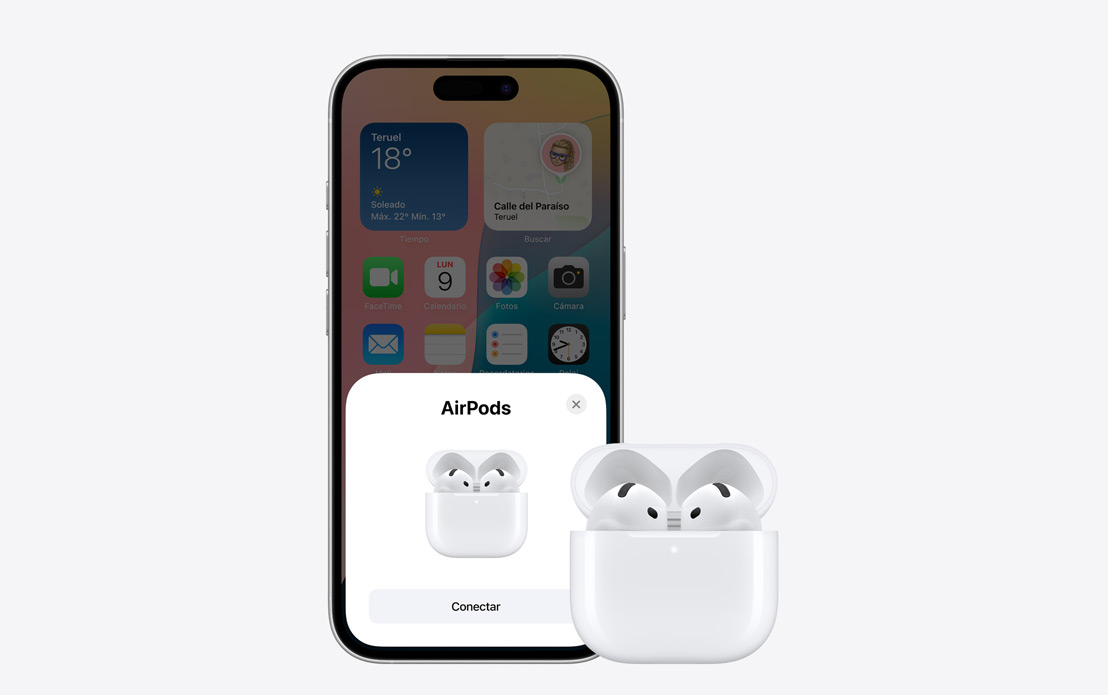 Unos AirPods al lado de un iPhone con un mensaje que confirma su conexión en la pantalla.