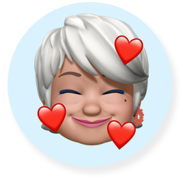 Smiling Memoji face - an older woman with short, white hair