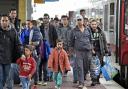 Refugees from Syria arrive at a train station in Dortmund, Germany.