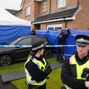 Police Scotland officers outside the home of Peter Murrell and Nicola Sturgeon in April 2023