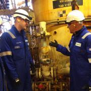 Serica Energy chief executive Chris Cox, right, on the Bruce platform north east of Aberdeen