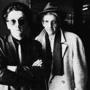 British singer-songwriters Elvis Costello (left) and Nick Lowe, London, 1986