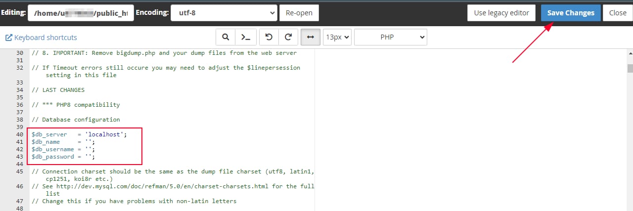 Editor file PHP Hostinger, bagian konfigurasi database disorot, tombol Save Changes ditandai