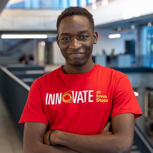 Senior Elvis Kimara poses in the Student Innovation Center.