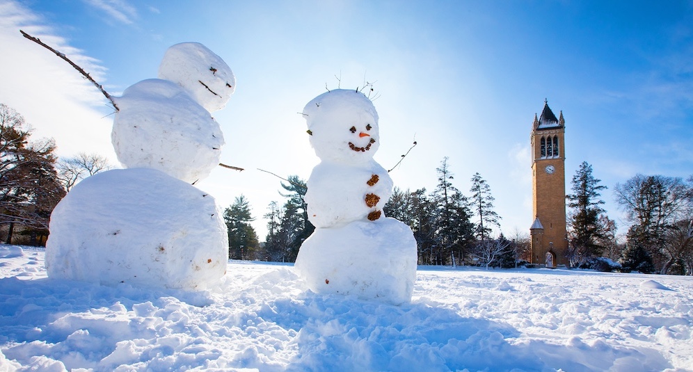 Snow people by the Campanile