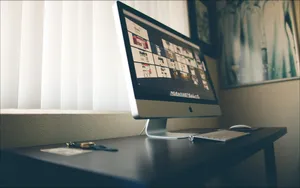 A Computer Screen Is On A Desk