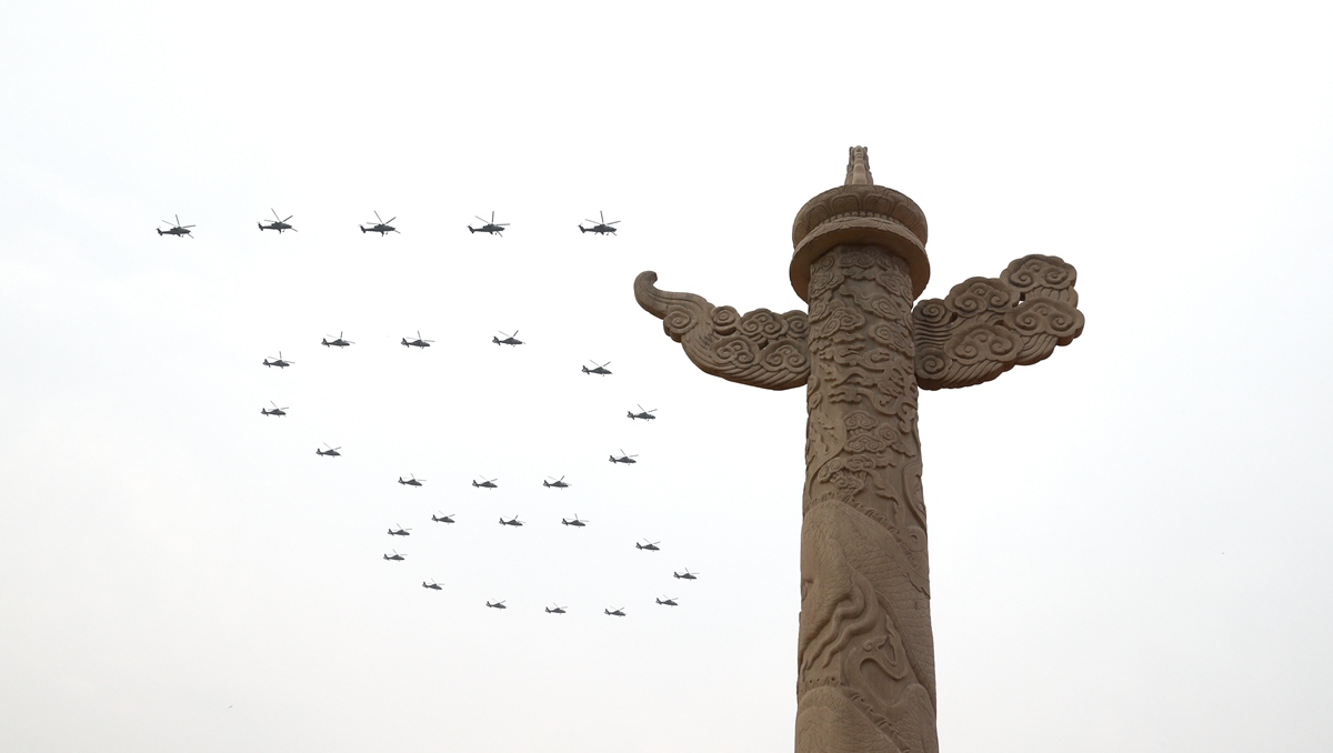 Military aircraft fly over Tian'anmen Square in echelons to mark CPC centenary