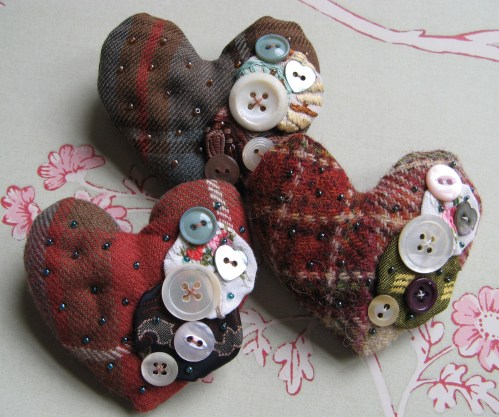 heart brooches reds