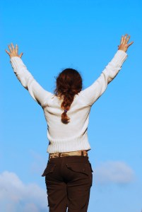 Woman with hands in air