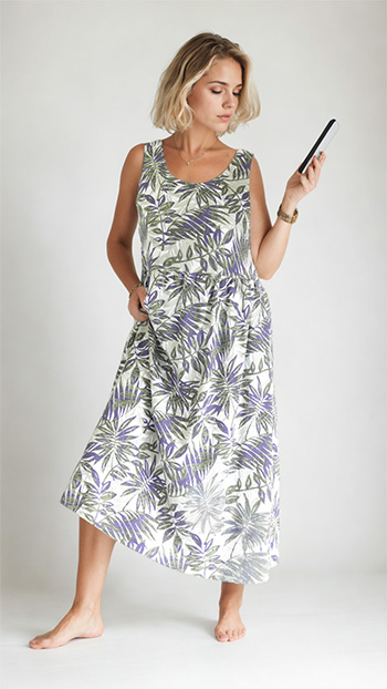An Angela Kane PDF sewing pattern - the 787 Sundress - the model is wearing this lovely dress made up in an exoctice print pure linen fabric.
