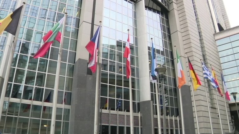 European and Swedish flags at half-mast in front of EP buildings in Brussels and Strasbourg as sign of solidarity for the victims of the attack at the education centre in Örebro, Sweden