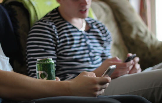 Two smartphone users Two smartphone users