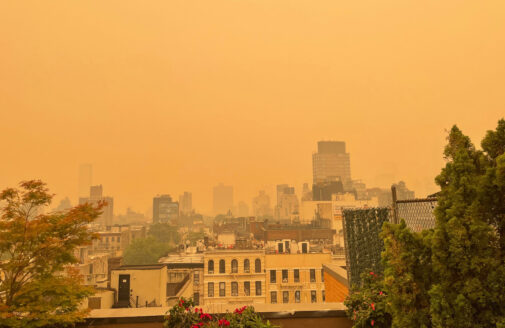 thick yellow haze over east village rooftop in New york city