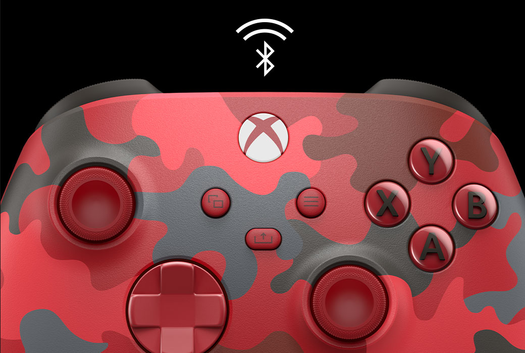 Close up of the Xbox Wireless Controller Daystrike camo with a Bluetooth icon 