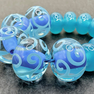 Handmade lampwork glass beads by Laura Sparling Handmade lampwork glass beads by Laura Sparling