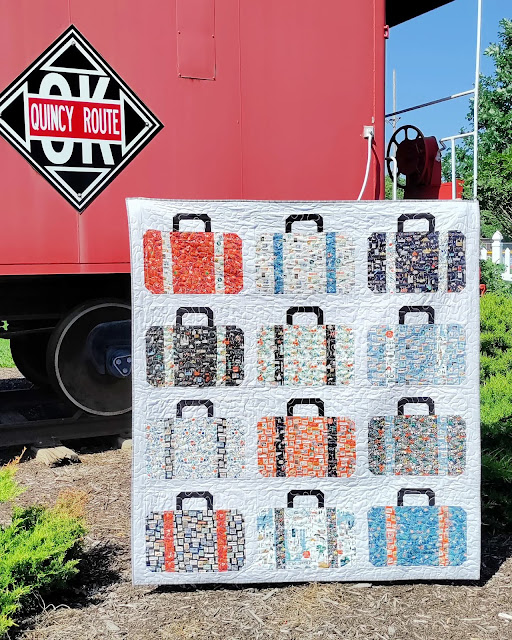 Rifle Paper Co. Suitcases travel-themed quilt Rifle Paper Co. Suitcases travel-themed quilt