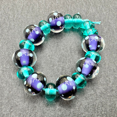Handmade lampwork glass beads by Laura Sparling Handmade lampwork glass beads by Laura Sparling