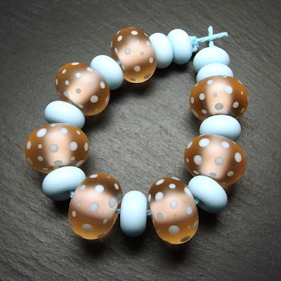 Lampwork glass beads by Laura Sparling Lampwork glass beads by Laura Sparling