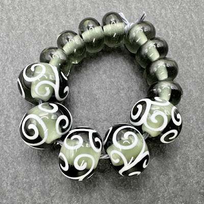 Handmade lampwork glass beads by Laura Sparling Handmade lampwork glass beads by Laura Sparling